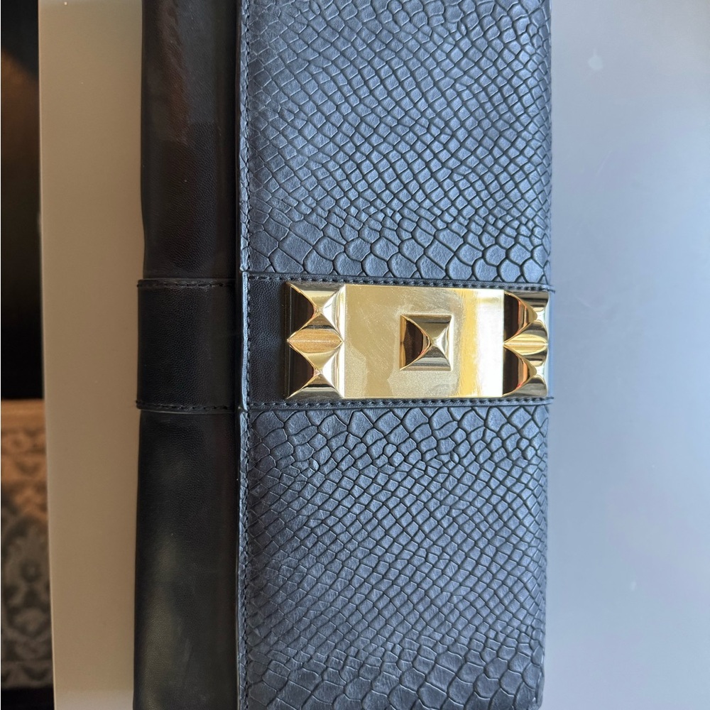 Stylish Black Clutch with Gold Accent